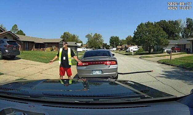 SPEEDER GIVES ONE-FINGER SALUTE, GOES TO JAIL