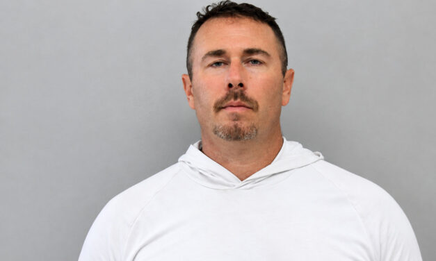 A man facing charges in connection with a reported bomb threat at an Owasso fitness center